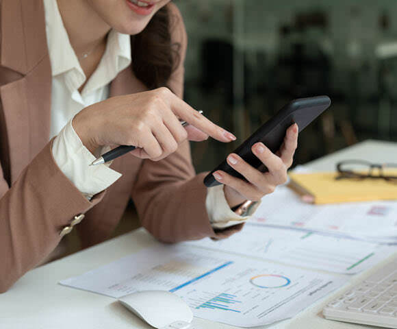 Manager reviewing attendance on a phone